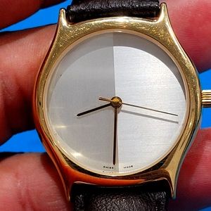 Swiss made Unisex watch classic leather strap unknown brand beautiful piece.Pre